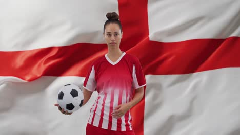 Animation-of-biracial-female-soccer-player-over-flag-of-england