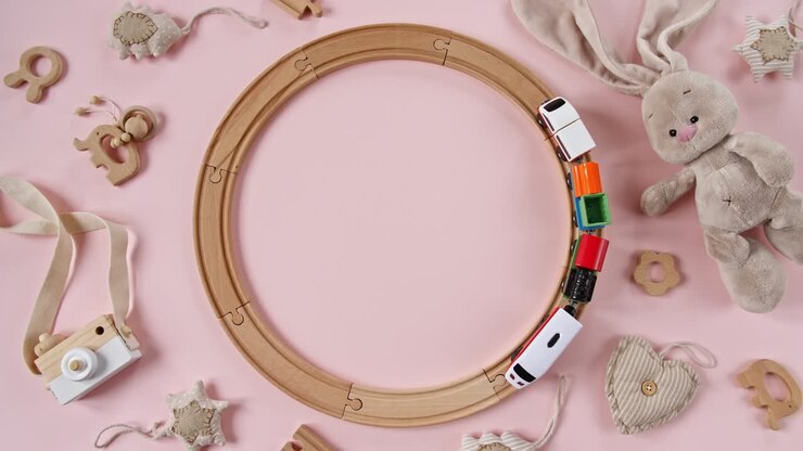 Childish Toy Wooden Railway. Toy Train Travel Along the Ring Railway. Child's Educational Toys. Top View. Copy Space