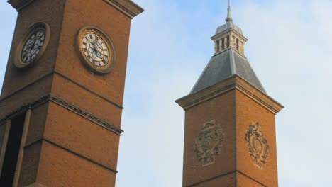 ancient clock tower at the entrance of liverpool street station in london, united kingdom