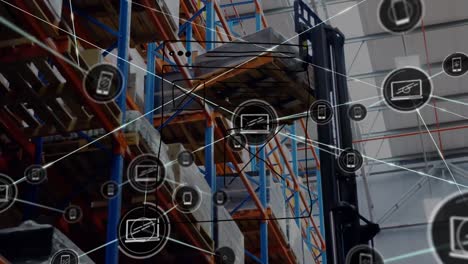 Animation-of-paper-illustration,-connected-icons,-low-angle-view-of-crane-with-pallet-in-warehouse