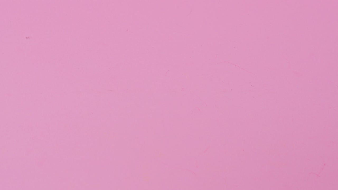 Stop-motion animation spelling out "Mother's Day" with paper letters on pink background