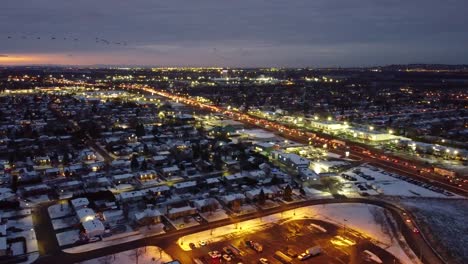 snowy candiac, quebec, canada, at twilight flock of birds aerial