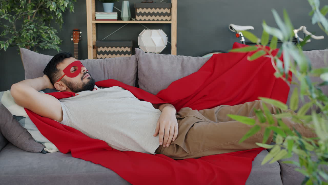 Man Sleeping on a Couch as a Superhero