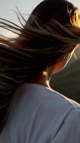 woman enjoying a beautiful sunset view in the mountains