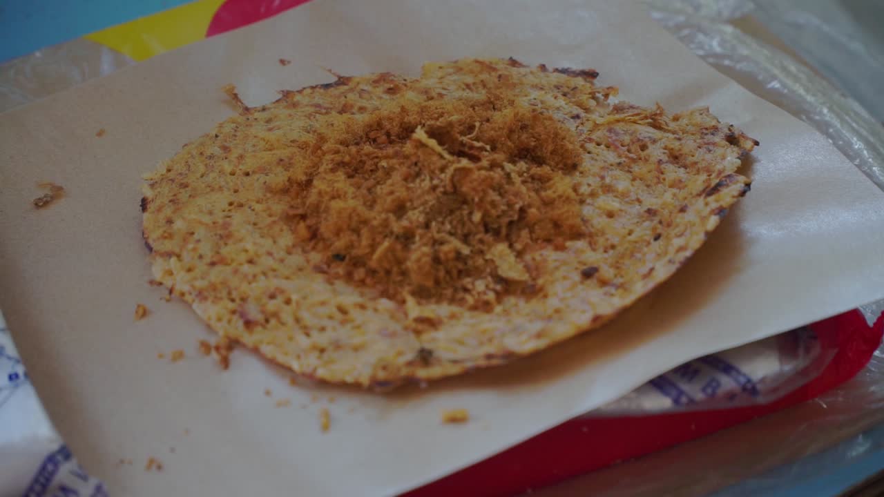 Traditional food &amp;quot;Kerak Telor&amp;quot; From Jakarta, Indonesia, made from rice