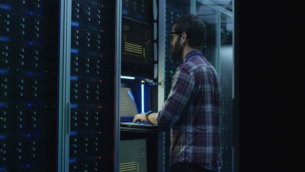 IT Professional Working with Servers in a Data Center