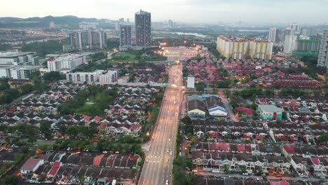 aerial view of a malaysian city with highway and residential areas