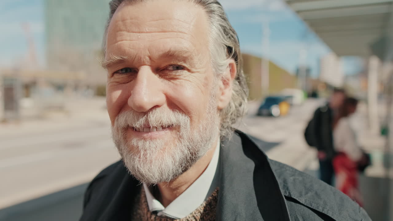 Happy Businessman Smiling at City Bus Stop
