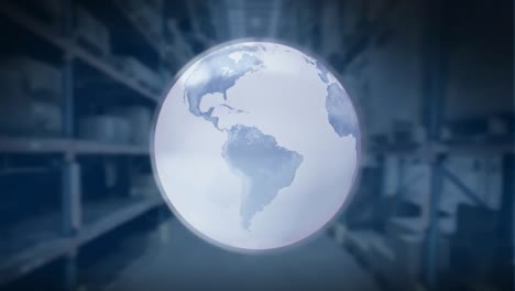 Digital-animation-of-spinning-globe-against-warehouse-in-background