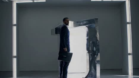 businessman walking through modern office