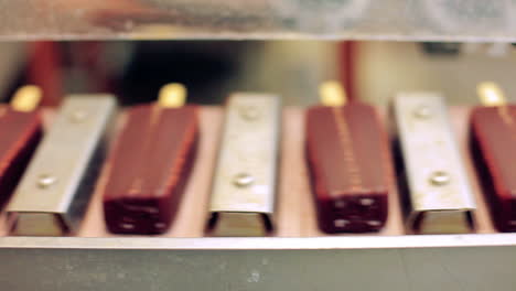 chocolate ice cream manufacturing line. food factory. food on conveyor belt