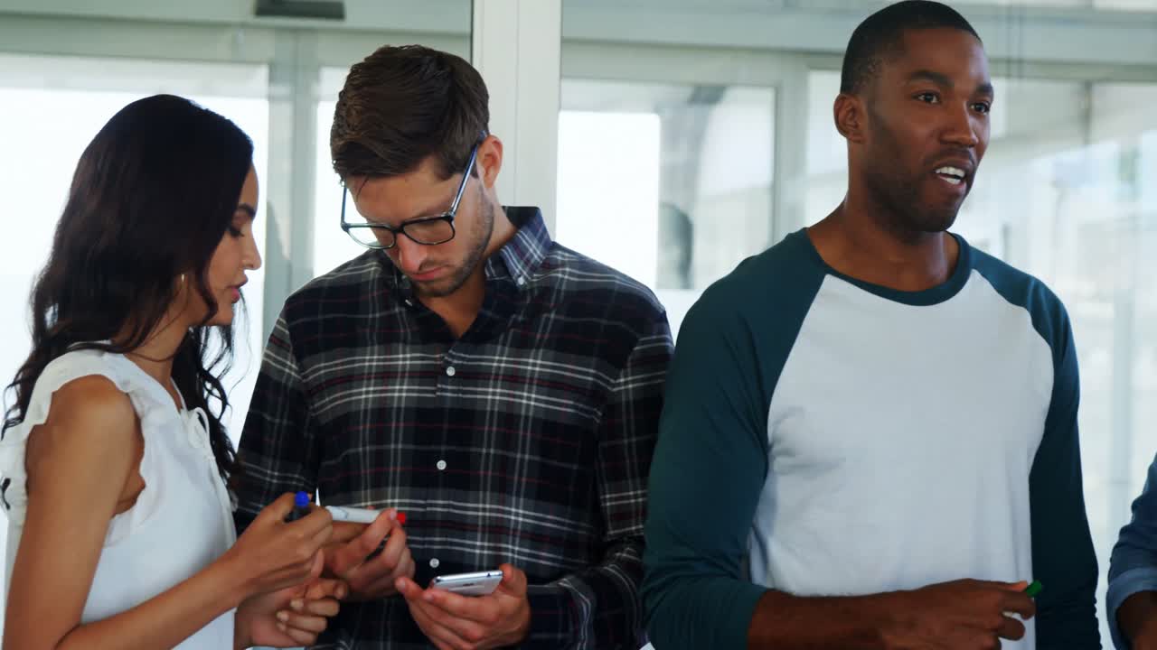 Executives discussing in office