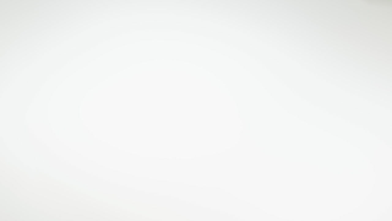 Veterinarian examining an animal X-ray with a pen