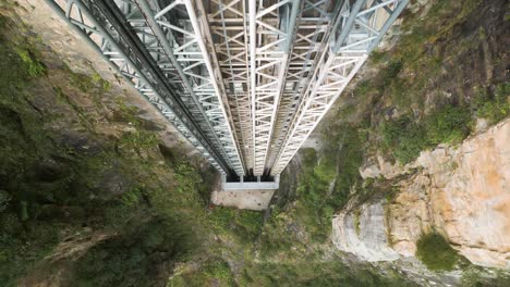 close ascending shot of the bailong elevator lift leaving zhangjiajie national park, china