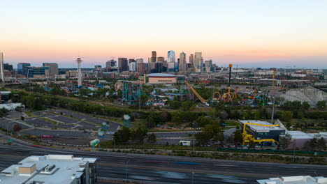 aerial sunset hyperlapse toward elitch gardens theme park