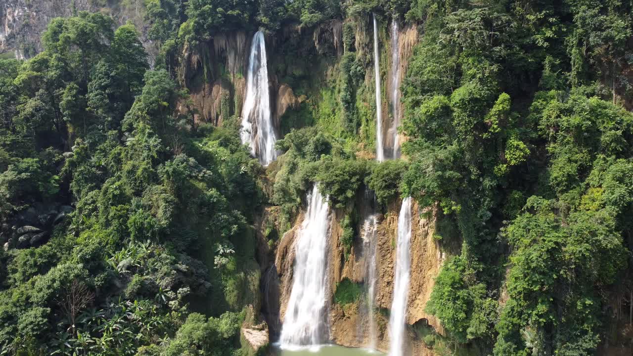 A gorgeous 4K drone shot, rotating around Thi Lo Su Waterfall in the adventures jungle of Umphang, located in the country of Thailand in Southeast Asia