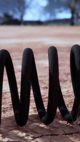 rusty coil spring on the ground