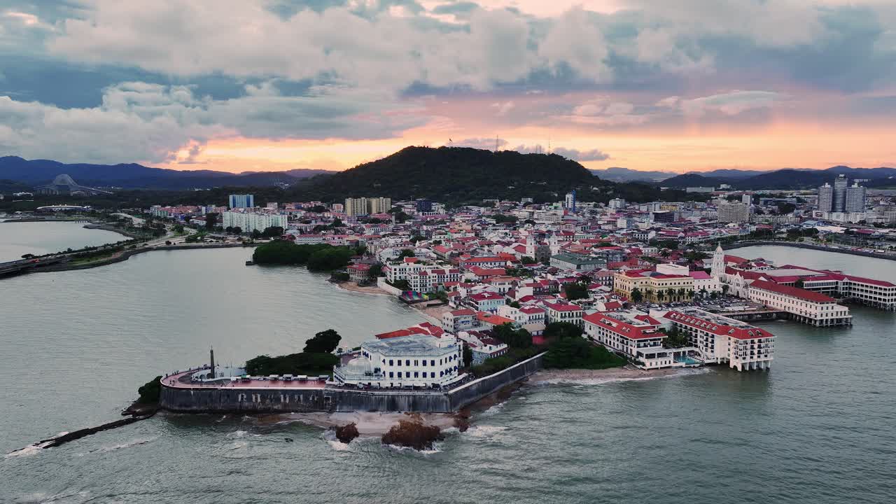 Drone shot of Las Bobedas in the Old Town and Ancon Hill in the background during sunset