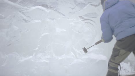 ice carving artist at work