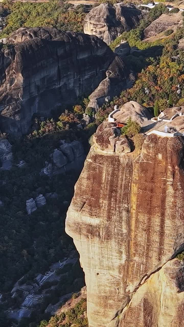 Meteora monasteries on cliffs in Greece during clear daylight hours