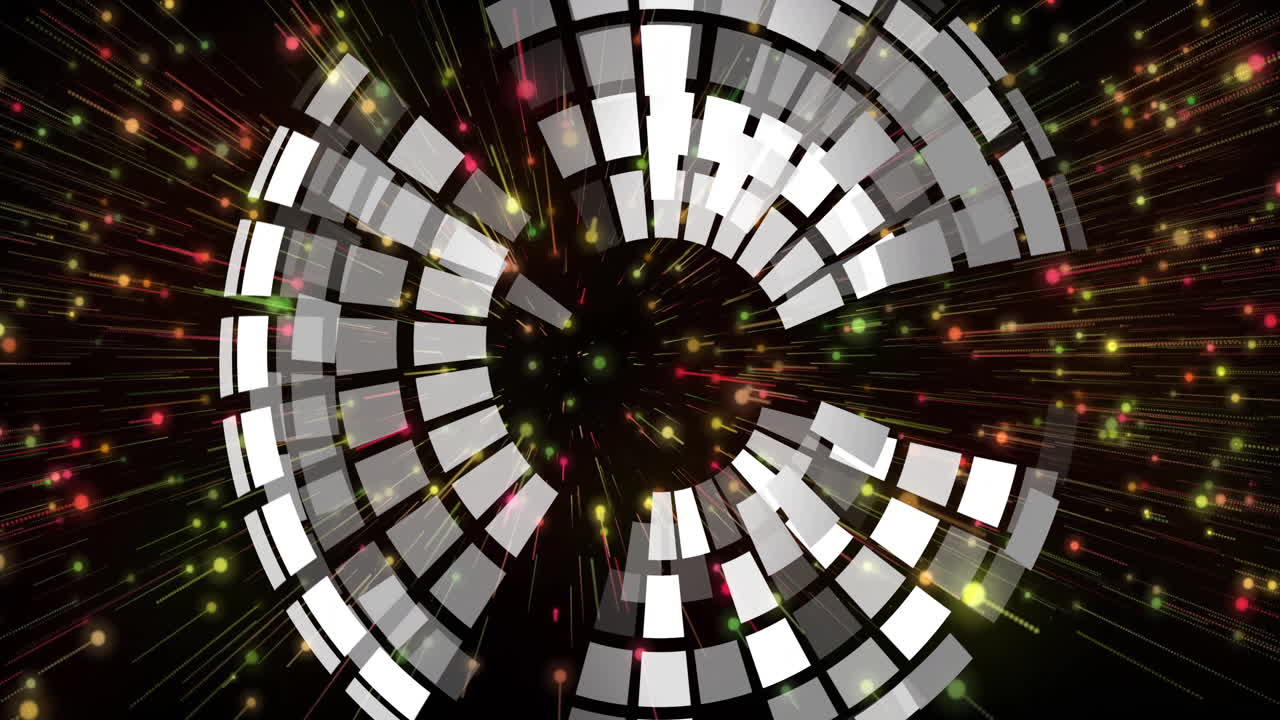 Data visualization being animated in scene, with concentric segmented rings and glowing particles