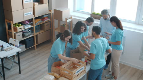 Volunteers Sorting Donations at a Food Bank