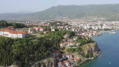 Lake-Ohrid-Coastline-in-summer-with-boats-on-water,-North-Macedonia