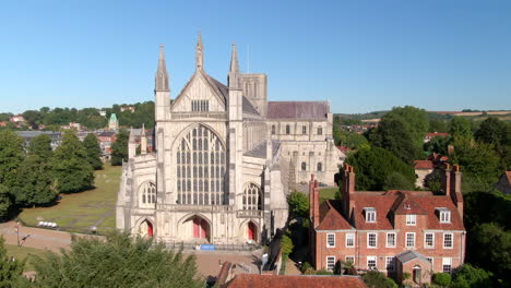 drone tracking shot of winchester cathedral, captured in summer in hampshire, uk