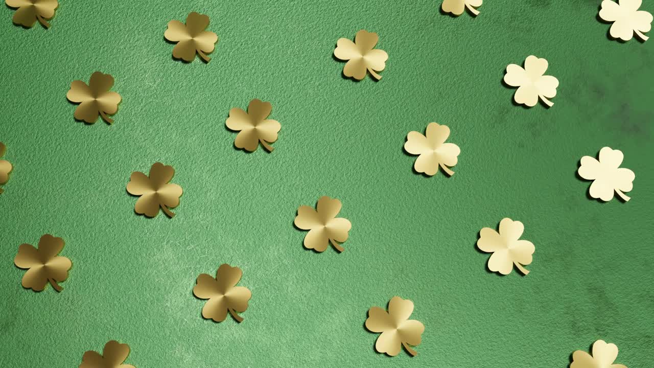 trébol de cuatro hojas doradas en fondo verde buena suerte animación de renderización 3d bucle sin fin