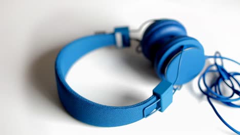 auriculares azules giran 00