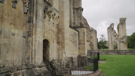 glastonbury abbey ruins, camera tilt top to bottom 4k slow motion