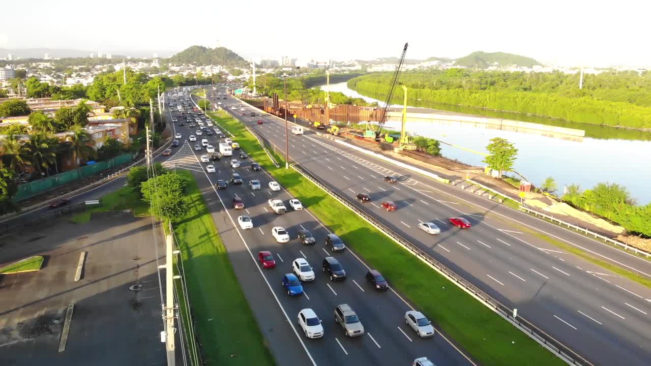 Early Morning Aerial Shot Toward Heavy Traffic on Puerto Rico
