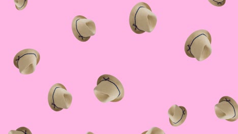 animación de sombreros con cinta cayendo sobre un fondo rosa