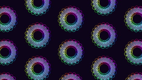 patrón simétrico en espiral vibrante de líneas coloridas sobre fondo negro