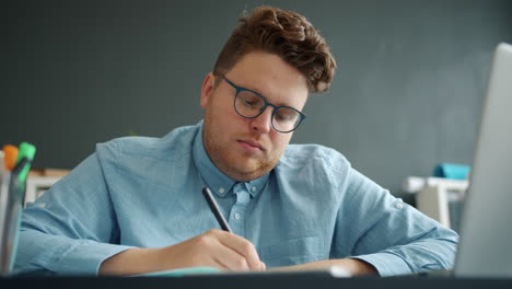 man working on laptop