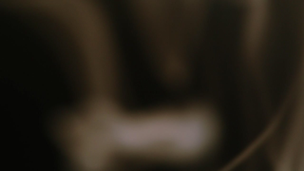 Soft Abstract Light Patterns Moving on Dark Background
