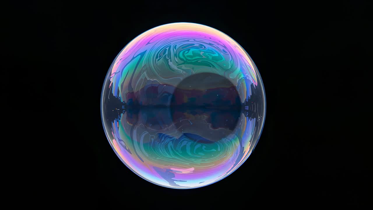 Appearing translucent iridescent soap bubble rotating on black void, showing shifting pastel colors