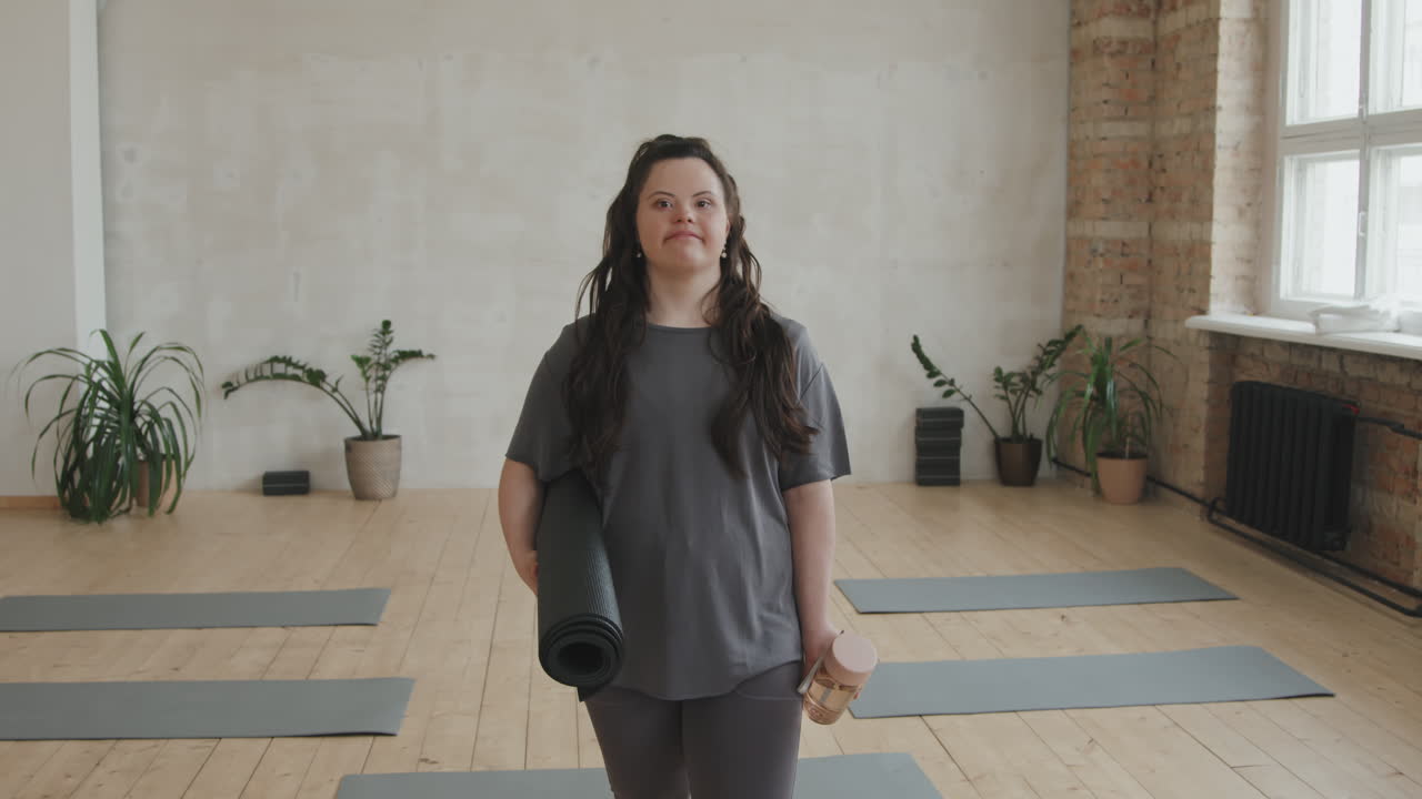 Zoom-In Portrait Of Young Woman With Down Syndrome At Yoga Class