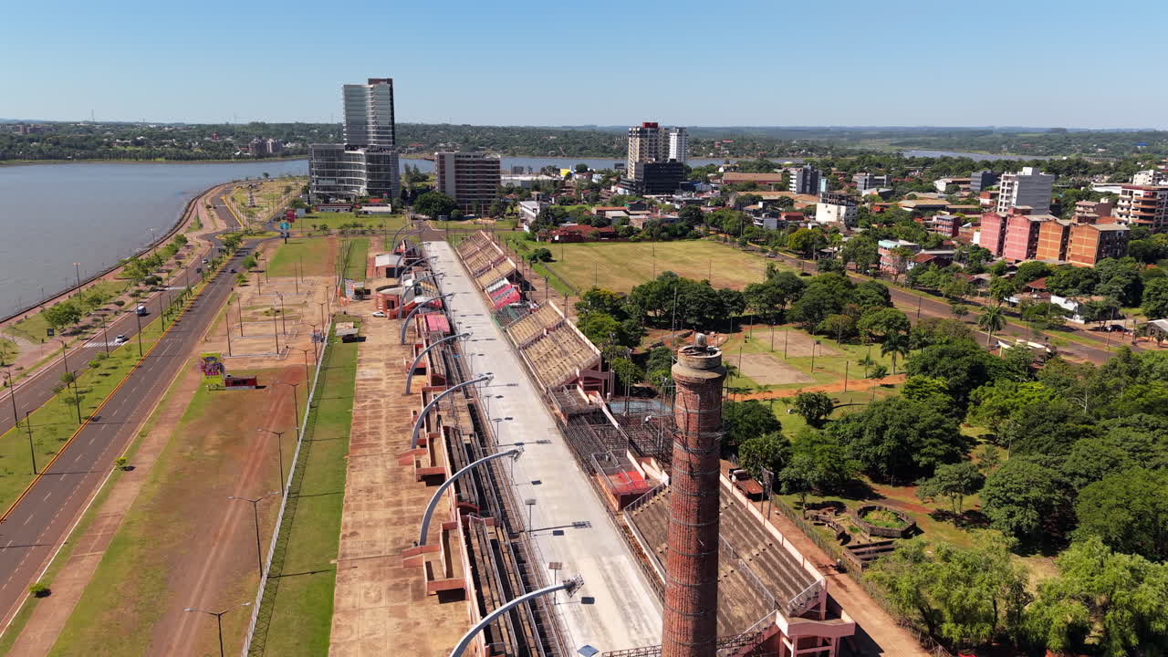 Aerial view of Encarnación Sambadrome and waterfront skyline. Cultural landmark. Paraguay.