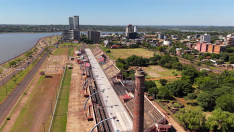 aerial view of encarnación sambadrome and waterfront skyline. cultural landmark. paraguay.