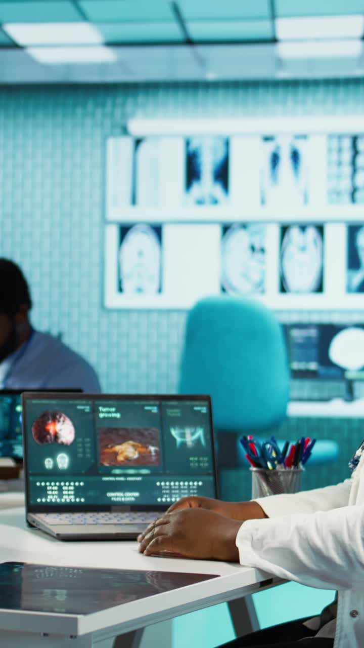 Medical Team Discussing Patient Scans in Modern Hospital Office