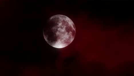 blood moon rising through thick overcast red clouds, haunted horror scene background