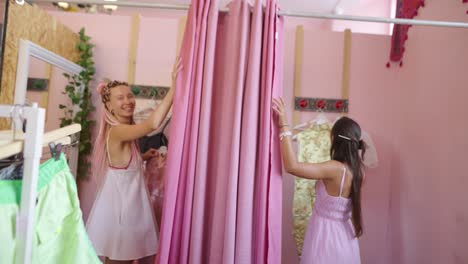 women shopping for clothes in a boutique dressing room