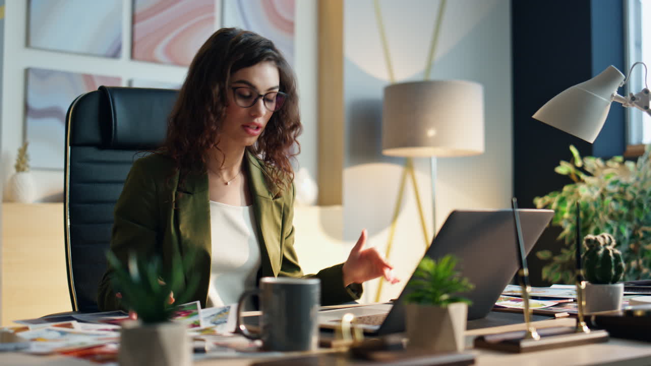 Manager arguing video conference in office close up. Girl talking in online chat
