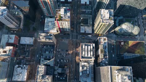 top-down aerial above skyscrapers and traffic in downtown seattle, hyperlapse