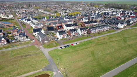 Jib-up-of-solar-panels-on-rooftops-in-suburban-area