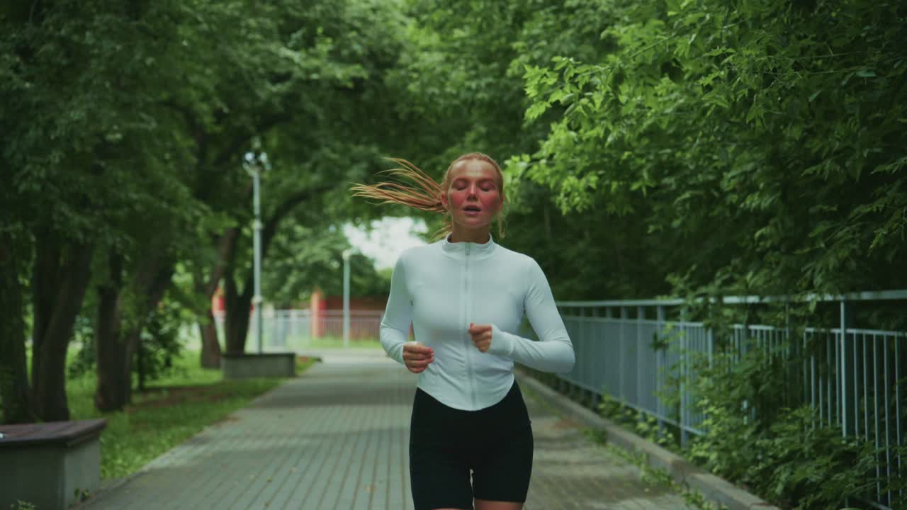 Woman running in a park