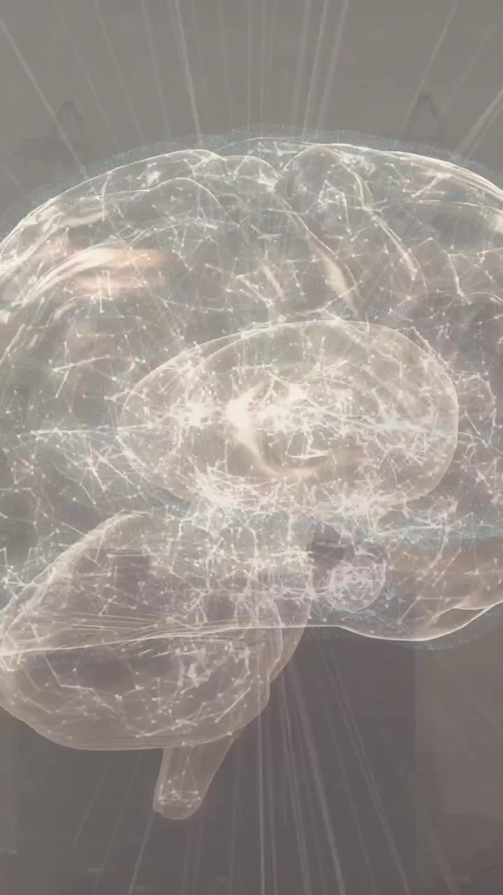 Video verticale: Cervello CG che ruota e pulsa mentre un fascio verticale allinea la linea mediana, rivelando il cervelletto.