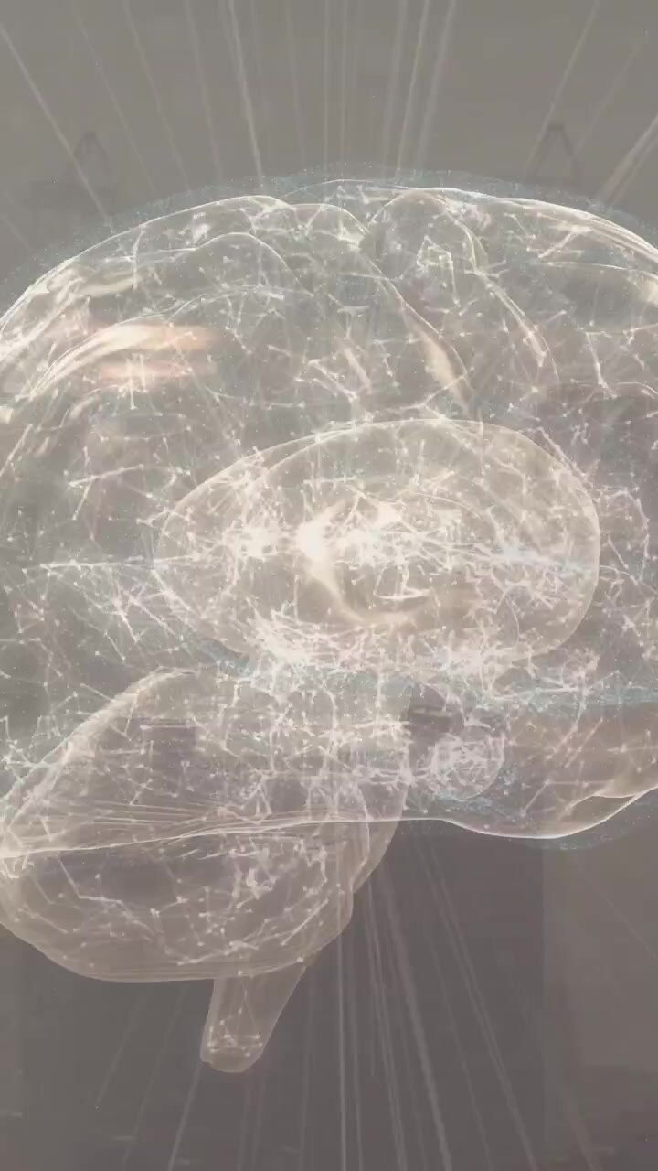 Video verticale: Cervello CG che ruota e pulsa mentre un fascio verticale allinea la linea mediana, rivelando il cervelletto.