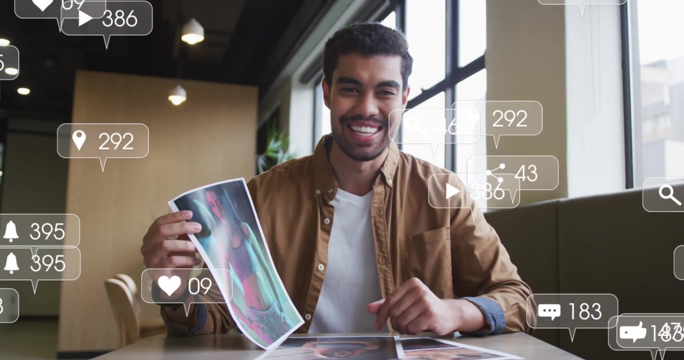 Animation of social media icons and numbers over businessman